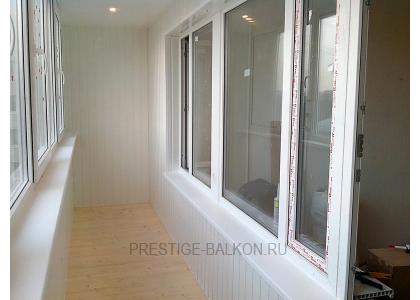 Теплое остекление балкона профилем rehau с утеплением и деревянной отделкой в Балашихе