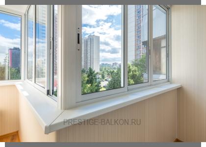 Холодное раздвижное остекление алюминиевыми окнами с отделкой стен и потолка ламинированными панели в Балашихе